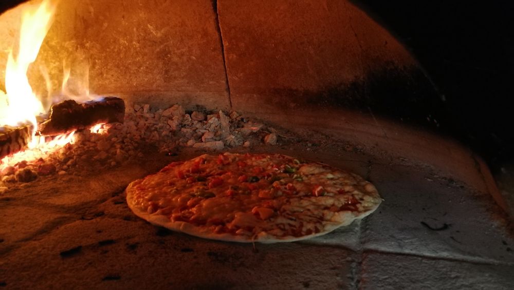 pizzas cuites au feu de bois